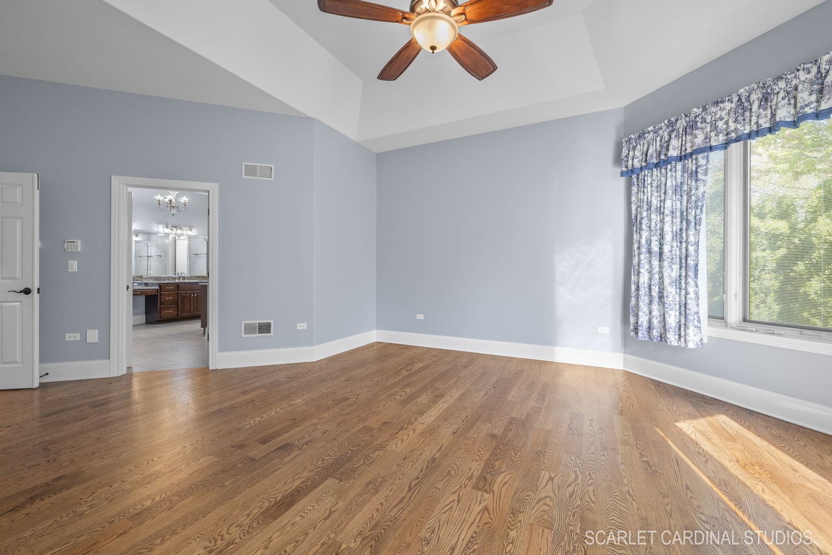 13334 Kerr Street Plainfield, IL 60585 - Photo 20 of 53 wooden floor in an empty room with a window