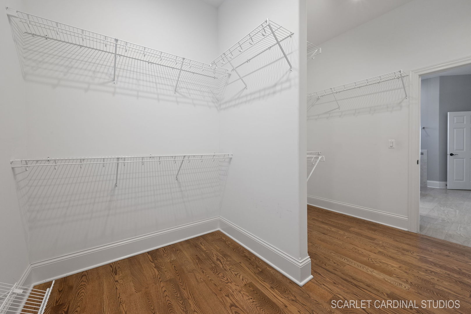 13334 Kerr Street Plainfield, IL 60585 - Photo 25 of 53 a view of a room with racks on the wall