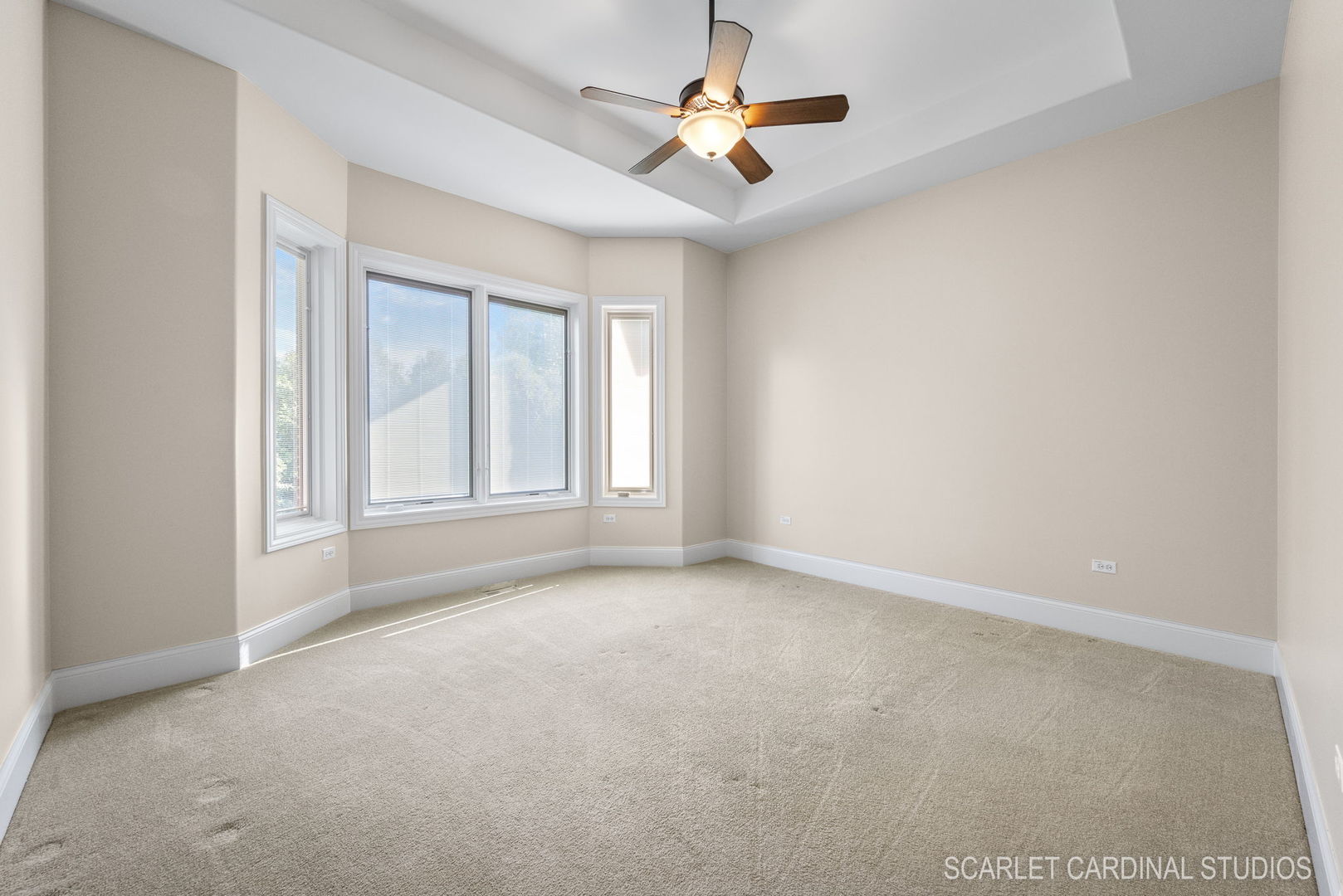 13334 Kerr Street Plainfield, IL 60585 - Photo 30 of 53 an empty room with windows and chandelier fan
