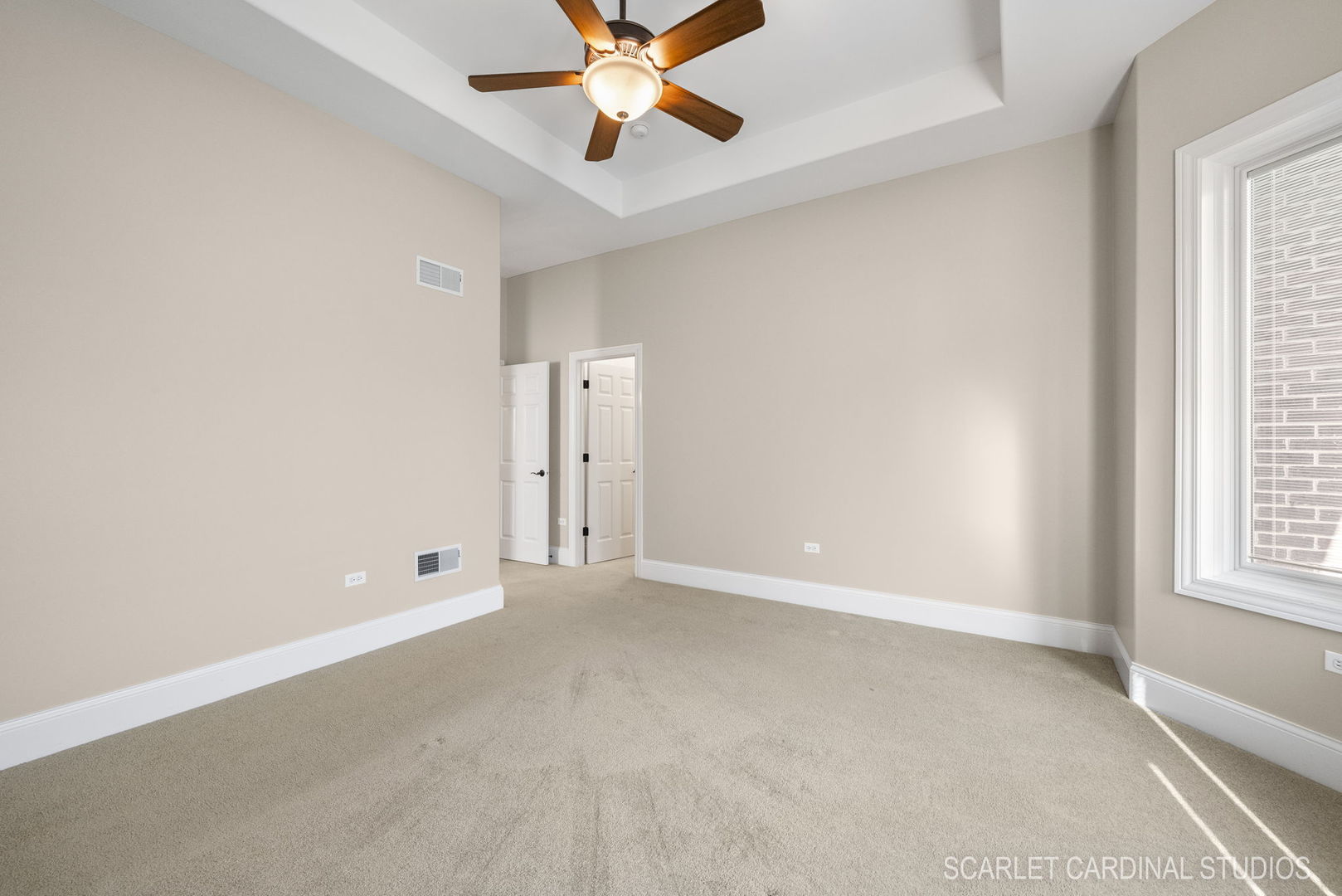 13334 Kerr Street Plainfield, IL 60585 - Photo 31 of 53 an empty room with windows and fan