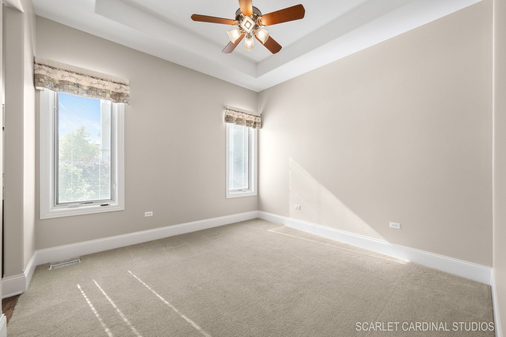 13334 Kerr Street Plainfield, IL 60585 - Photo 32 of 53 an empty room with windows and fan