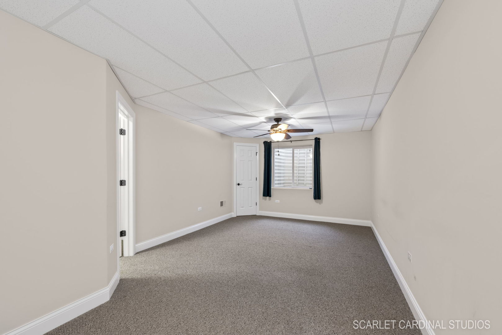 13334 Kerr Street Plainfield, IL 60585 - Photo 36 of 53 an empty room with chandelier fan and windows