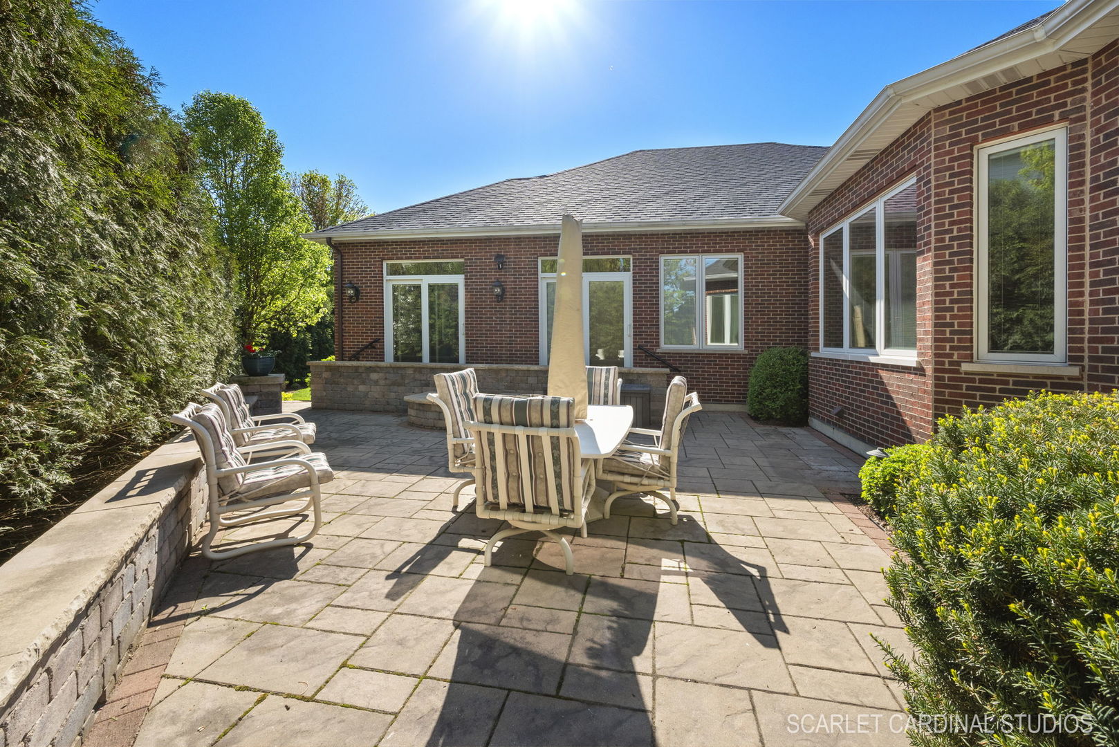13334 Kerr Street Plainfield, IL 60585 - Photo 40 of 53 a view of a house with backyard sitting area and garden