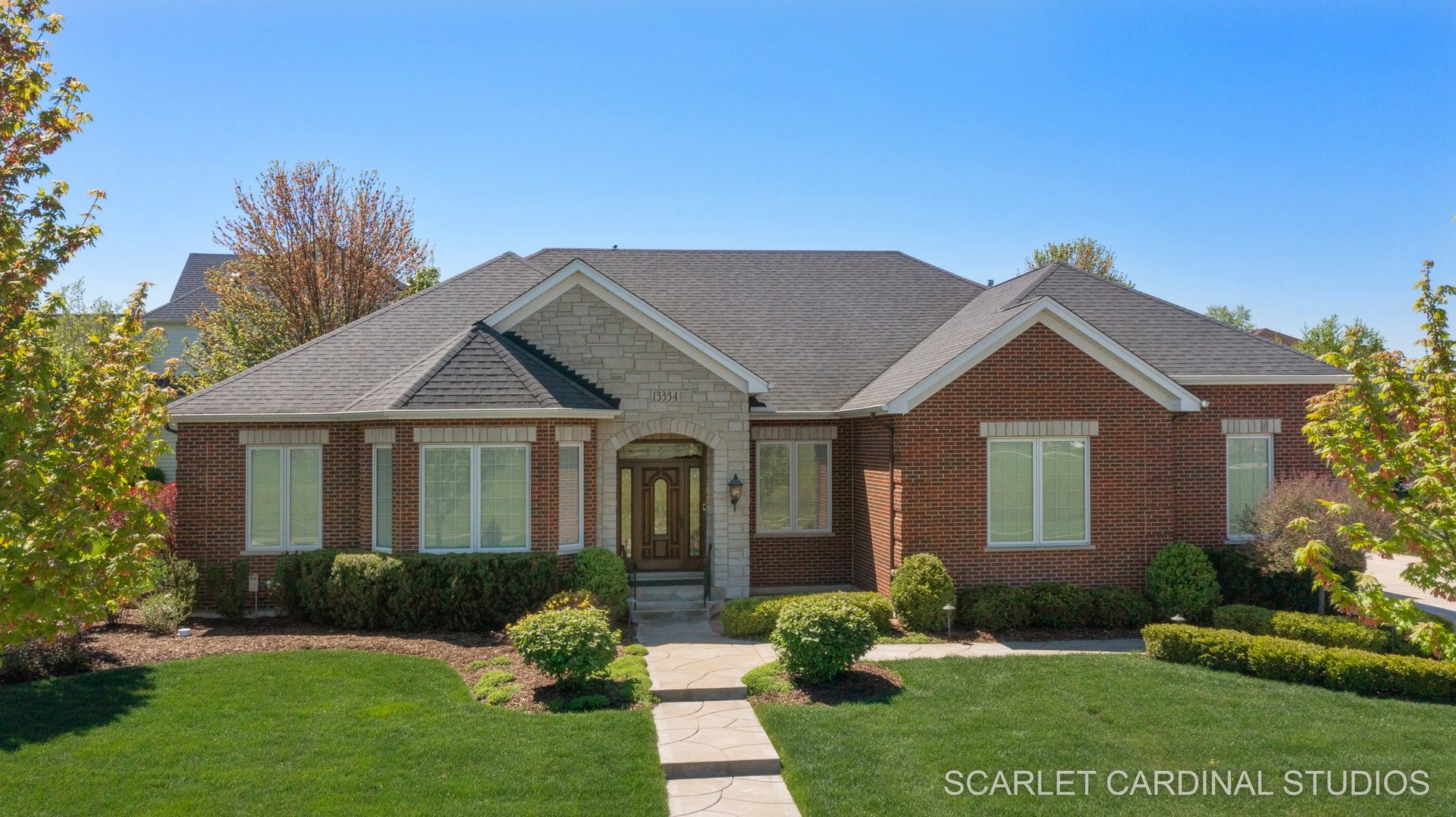 13334 Kerr Street Plainfield, IL 60585 - Photo 42 of 53 a front view of a house with a yard