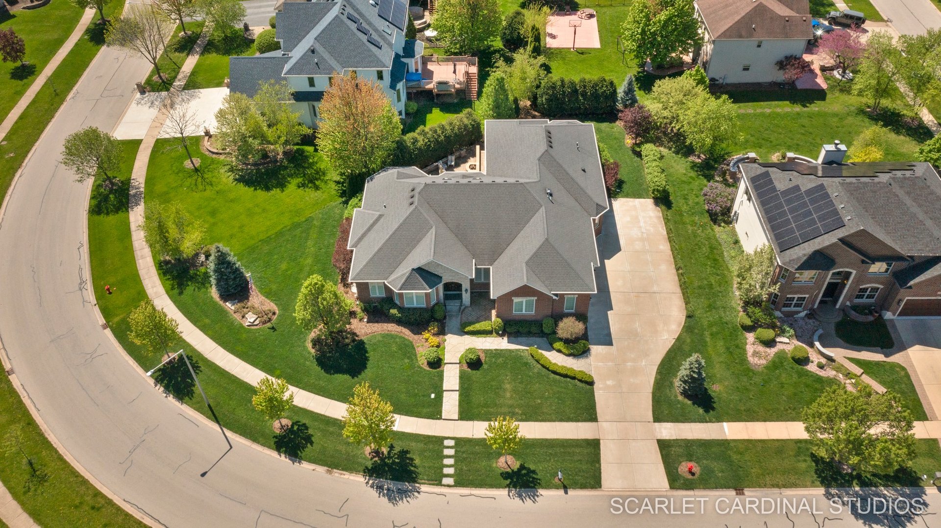 13334 Kerr Street Plainfield, IL 60585 - Photo 47 of 53 an aerial view of a house with swimming pool