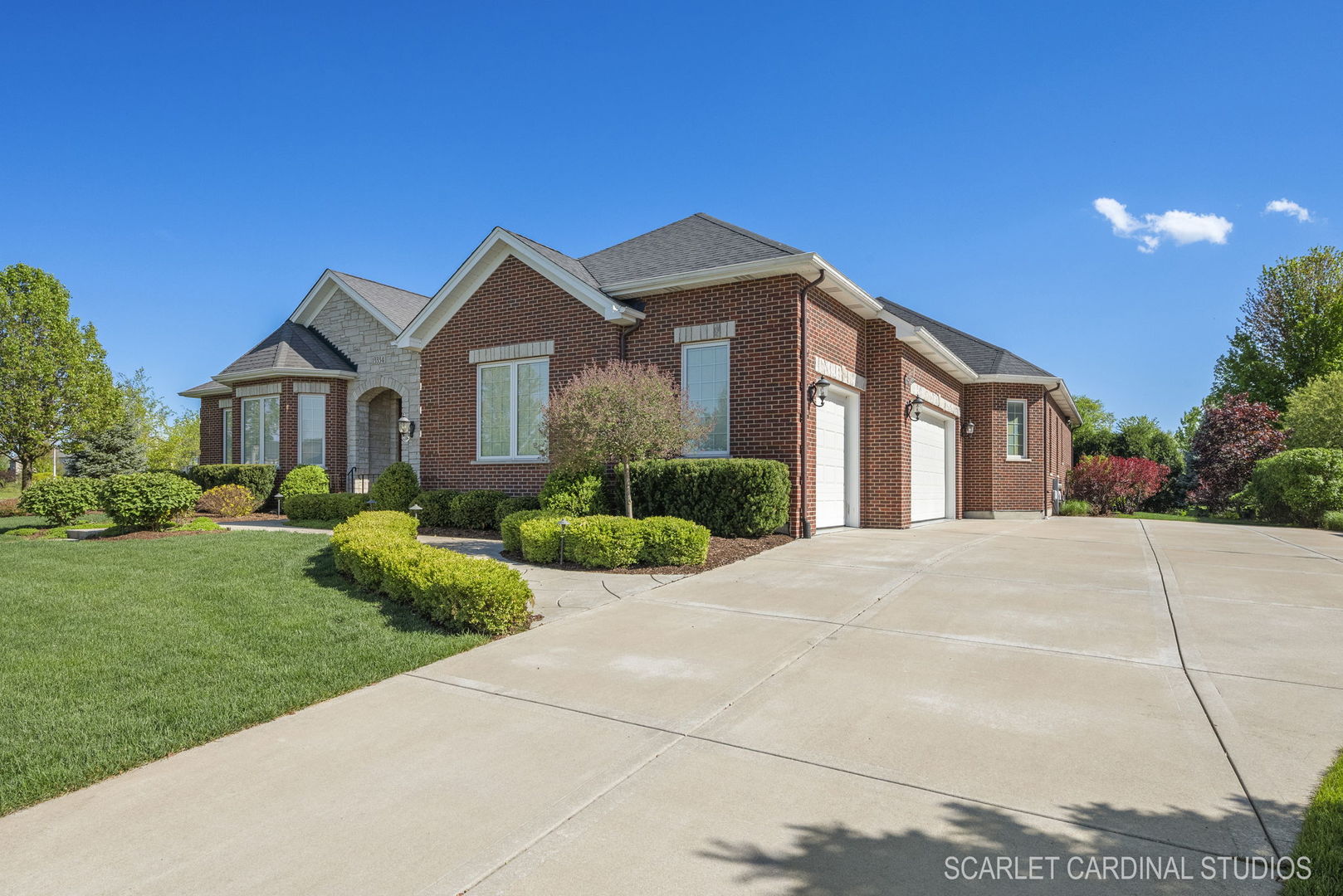 13334 Kerr Street Plainfield, IL 60585 - Photo 5 of 53 a front view of a house with a yard and garage