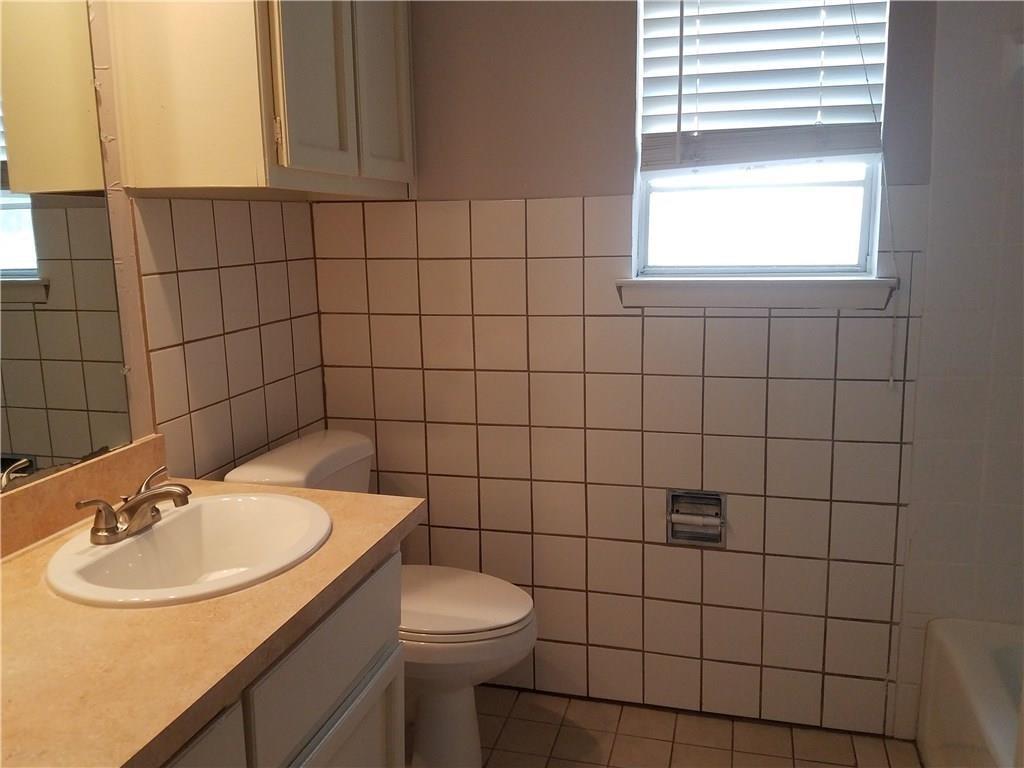 6919 West Cleburne Road Fort Worth, TX 76133 - Photo 13 of 15 Bathroom