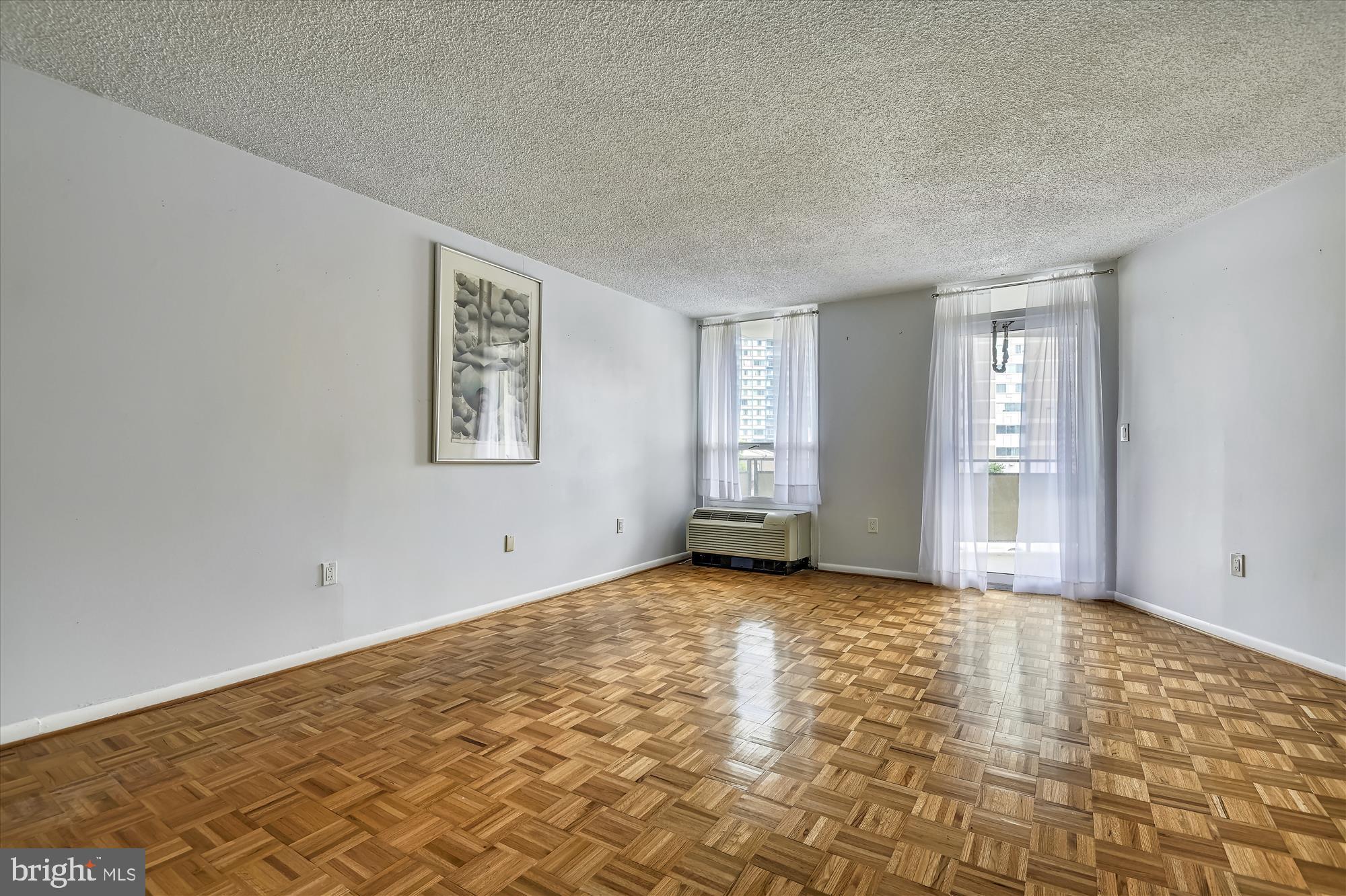 205 East Joppa Road, Unit 201 Towson, MD 21286 - Photo 13 of 37 Looking across the living room