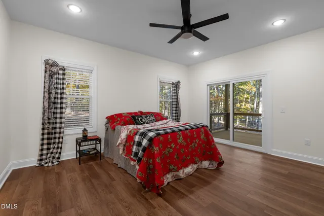 a bathroom with double vanity sink and a mirror
