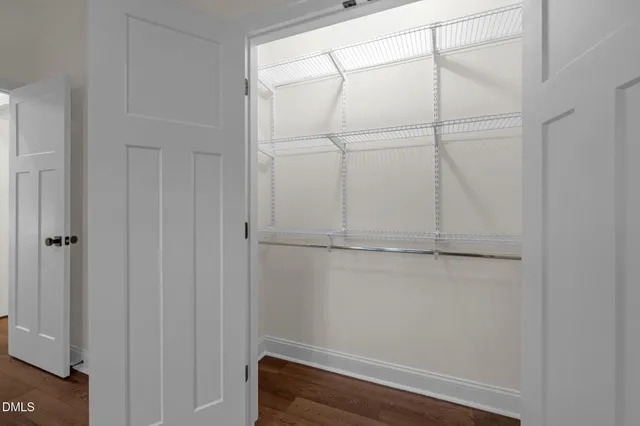 a bathroom with a shower toilet and sink