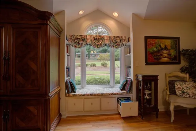 a view of a dining room with furniture window and outside view