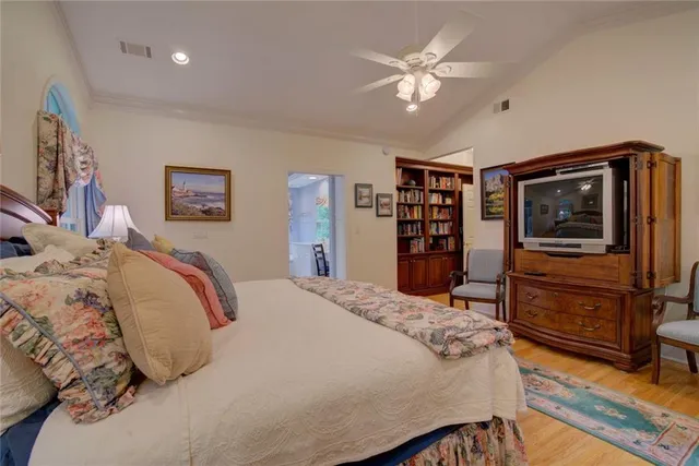 a bathroom with a toilet sink and shower