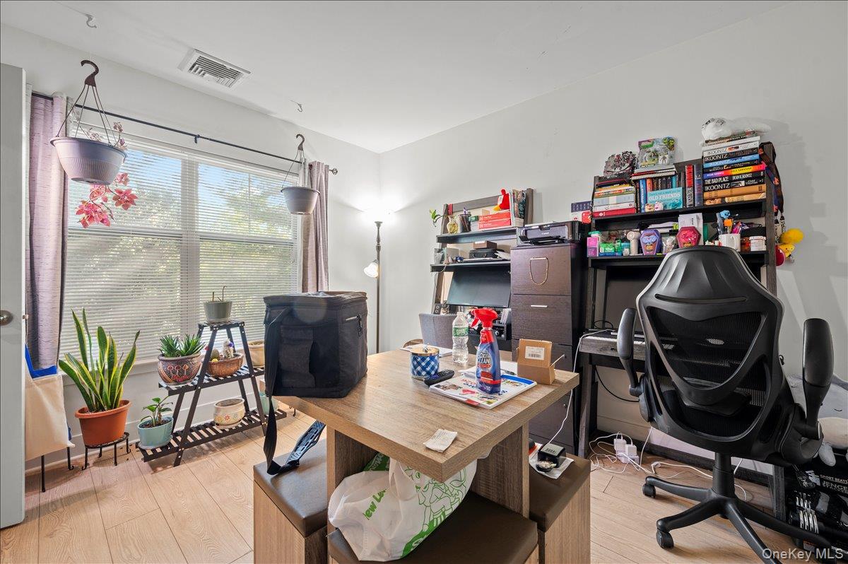 710 Main Street Peekskill, NY 10566 - Photo 14 of 26 a view of a workspace with furniture and a gym