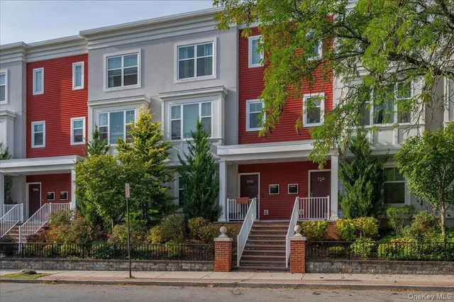 a front view of a multi story residential apartment building