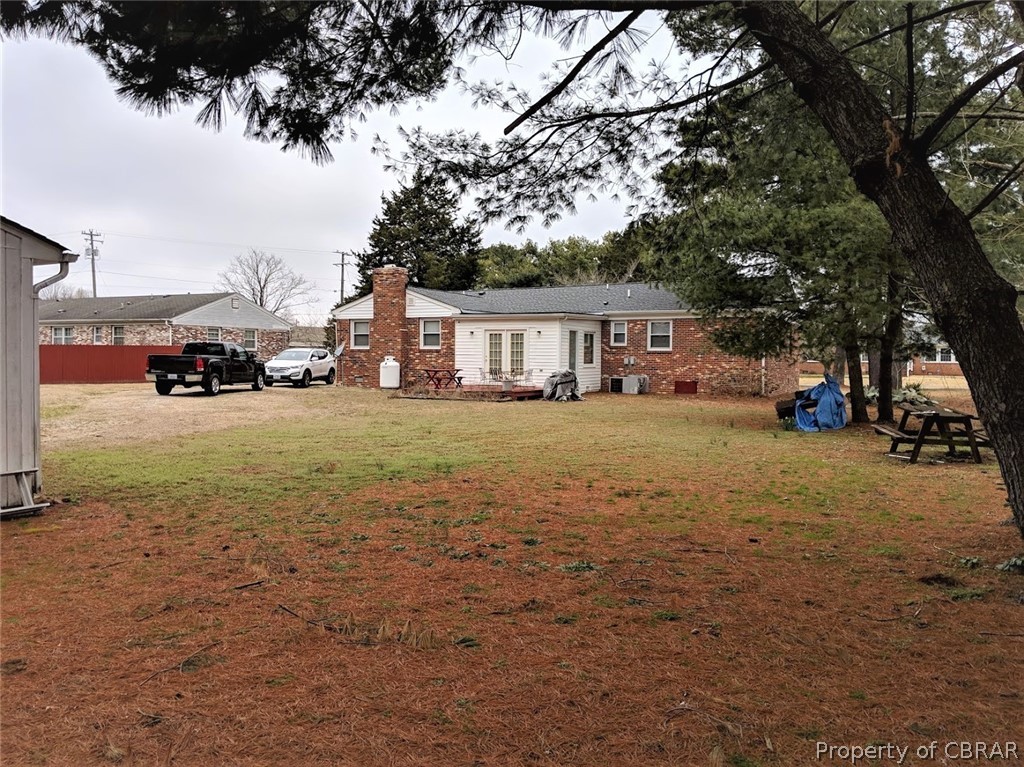 7692 Farmwood Road Gloucester Point, VA 23062 - Photo 17 of 23 Back of House with deck