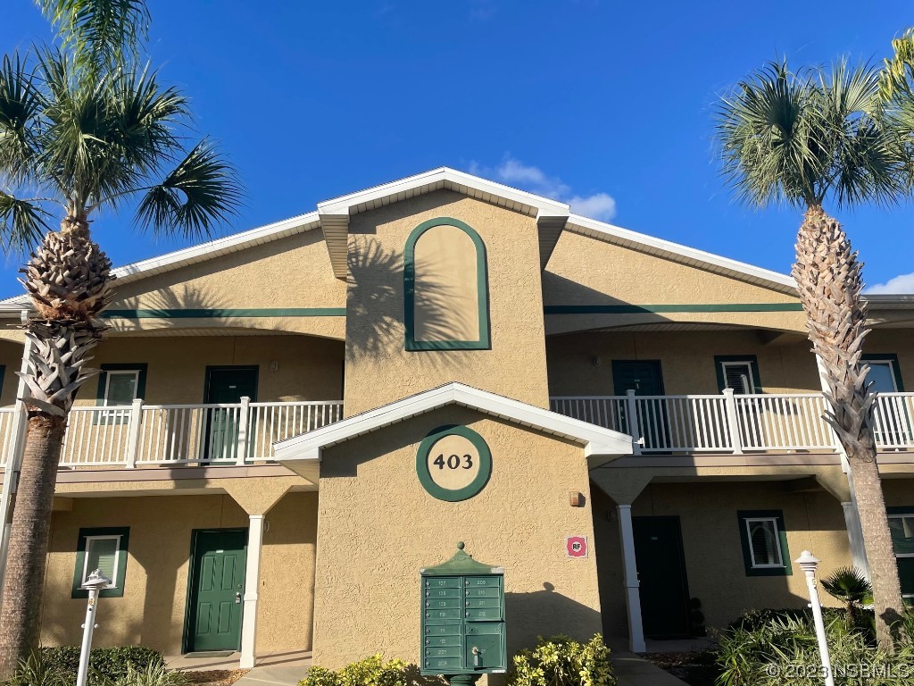 a view of multiple house with a street