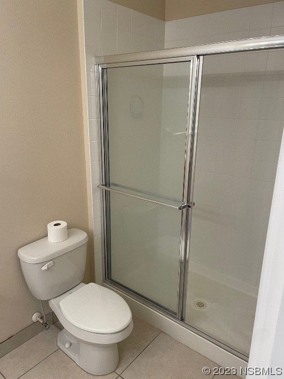 Undisclosed Address New Smyrna Beach, FL 32169 - Photo 14 of 22 a white toilet sitting next to a shower
