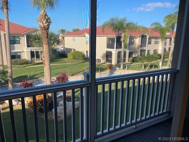 a view of a street from a balcony