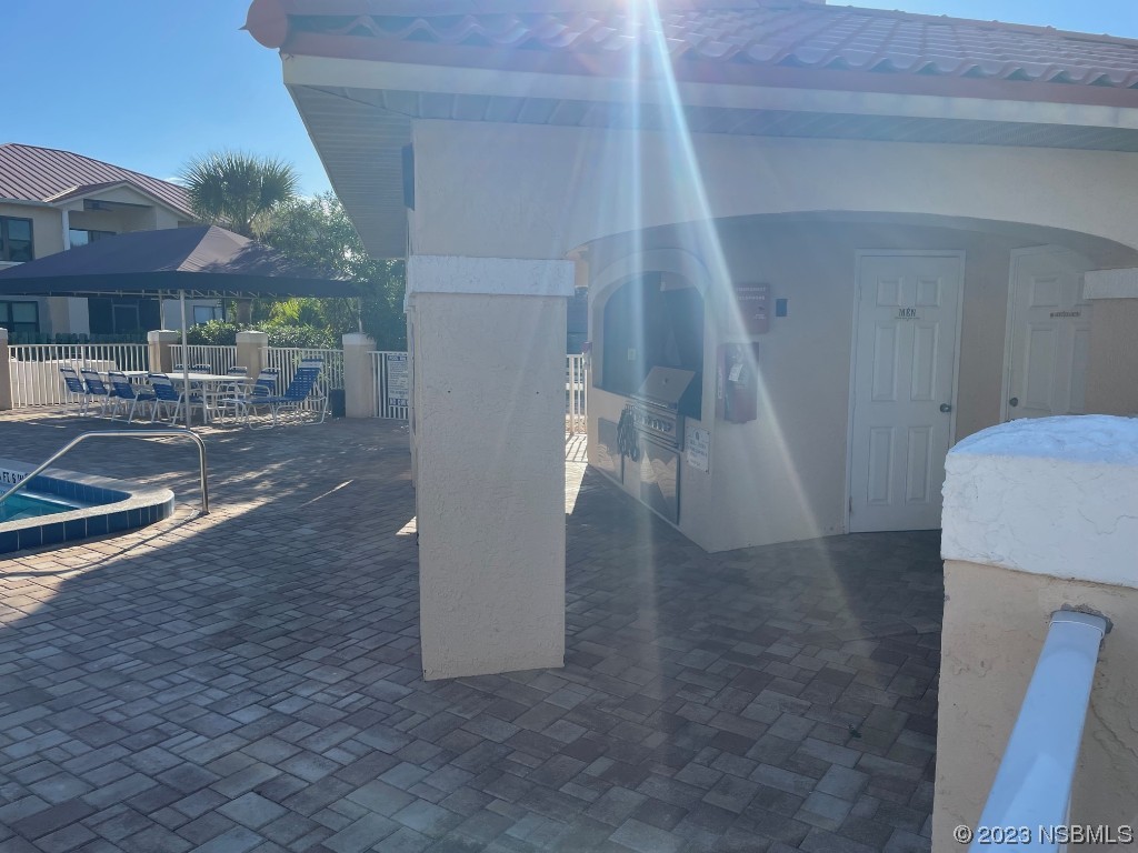 Undisclosed Address New Smyrna Beach, FL 32169 - Photo 17 of 22 a view of entryway and hall