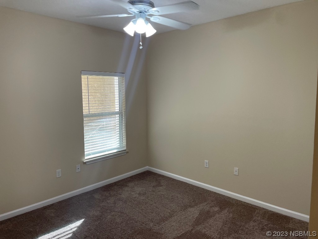 Undisclosed Address New Smyrna Beach, FL 32169 - Photo 10 of 22 an empty room with a window