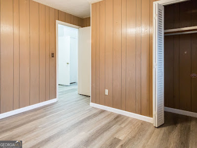 5209 Highway 32 Patterson, GA 31557 - Photo 24 of 45 an empty room with wooden floor