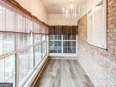 5209 Highway 32 Patterson, GA 31557 - Photo 29 of 45 a view of a room with wooden floor and windows