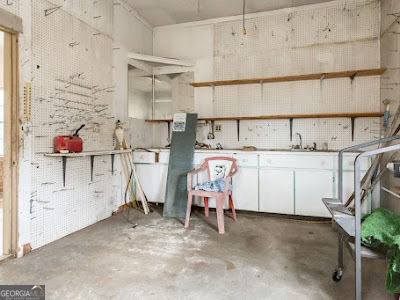 5209 Highway 32 Patterson, GA 31557 - Photo 42 of 45 a storage room with cabinets