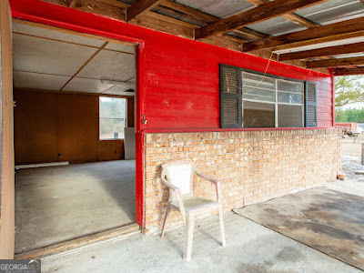 5209 Highway 32 Patterson, GA 31557 - Photo 44 of 45 a front view of a house with a yard