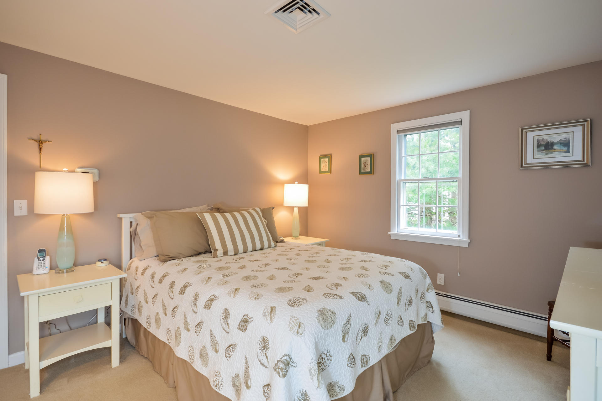 188 Ansel Howland Road Centerville, MA 02632 - Photo 17 of 24 a bedroom with a bed and a window