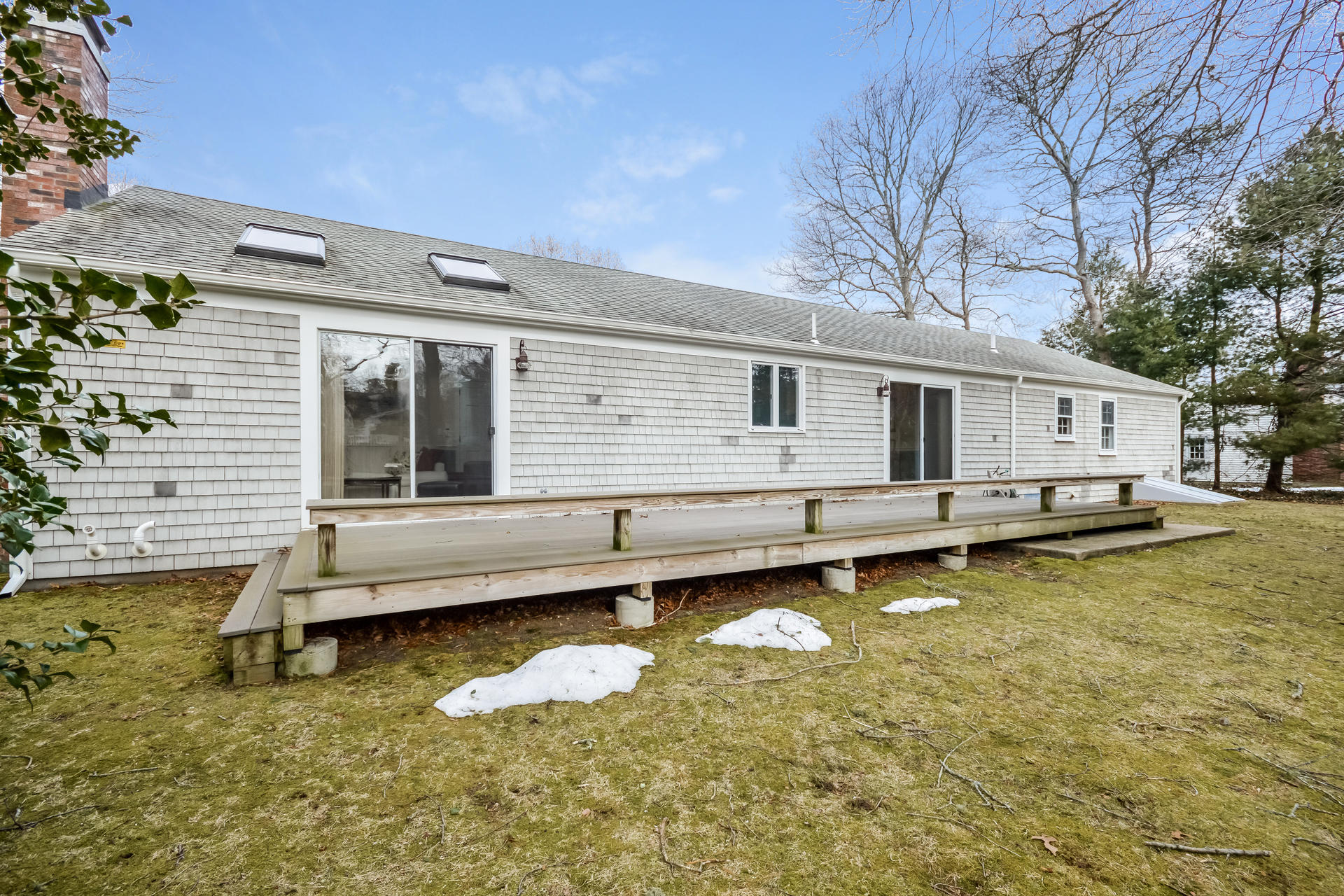 188 Ansel Howland Road Centerville, MA 02632 - Photo 22 of 24 a view of a house with swimming pool and porch