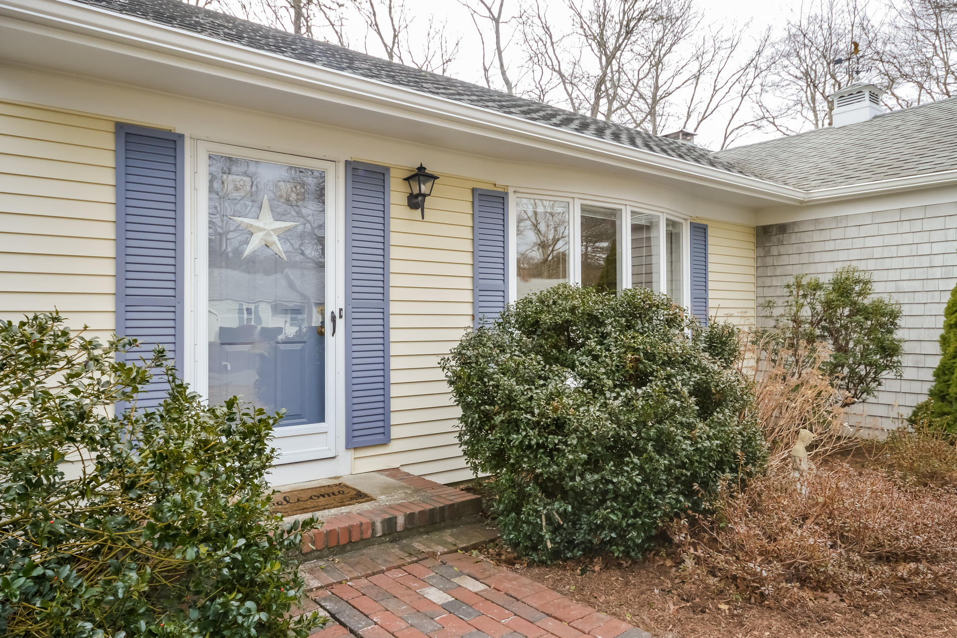 188 Ansel Howland Road Centerville, MA 02632 - Photo 3 of 24 a front view of a house with garden