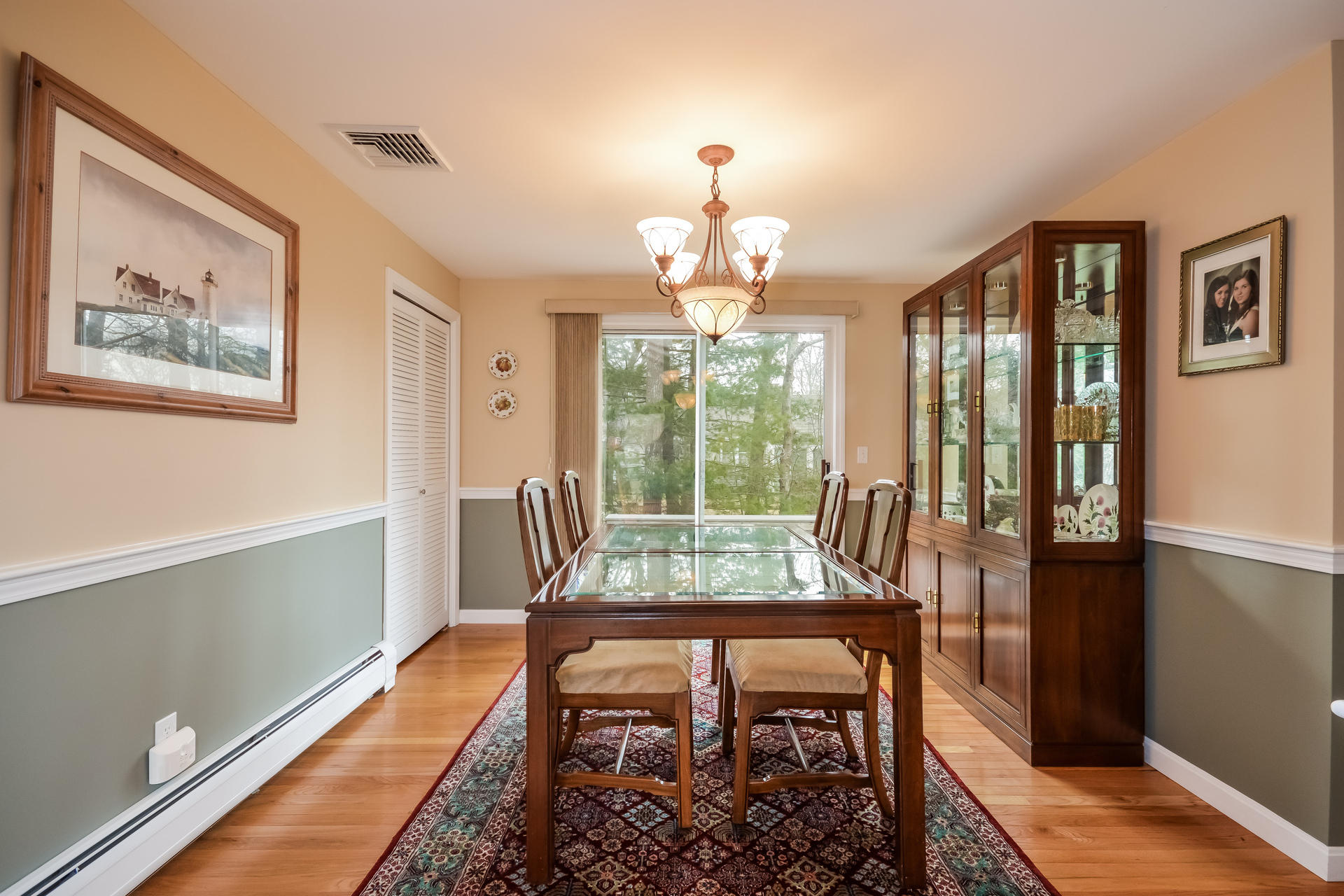 188 Ansel Howland Road Centerville, MA 02632 - Photo 7 of 24 a view of a dining room with furniture window and wooden floor