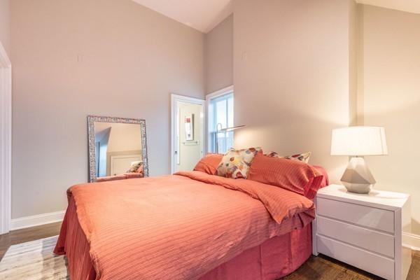 80 Rutland Street, Unit 3 Boston, MA 02118 - Photo 11 of 26 a bedroom with a bed and a window