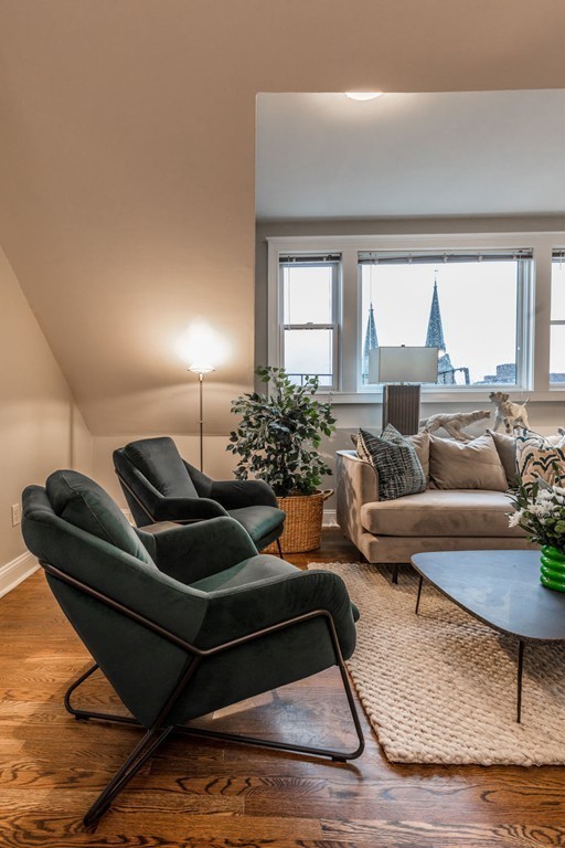 80 Rutland Street, Unit 3 Boston, MA 02118 - Photo 12 of 26 a living room with furniture and a large window
