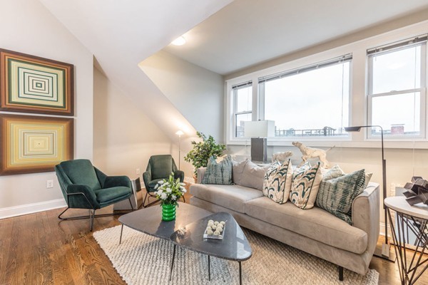80 Rutland Street, Unit 3 Boston, MA 02118 - Photo 13 of 26 a living room with furniture and floor to ceiling windows