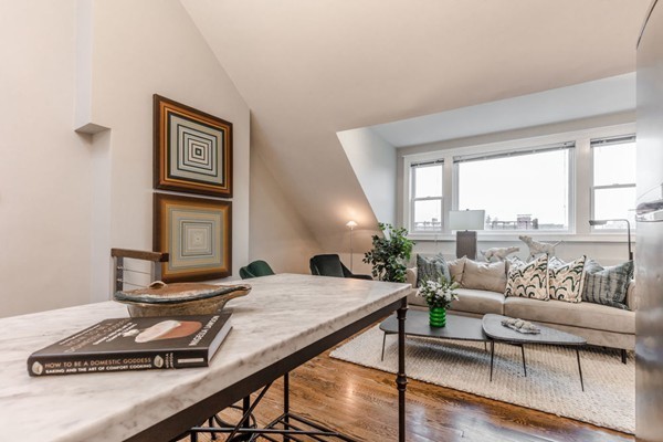 80 Rutland Street, Unit 3 Boston, MA 02118 - Photo 18 of 26 a living room with furniture and a floor to ceiling window