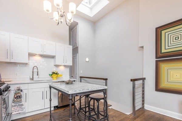 80 Rutland Street, Unit 3 Boston, MA 02118 - Photo 2 of 26 a kitchen with a sink a cabinets and appliances
