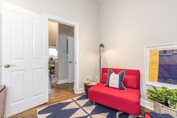 80 Rutland Street, Unit 3 Boston, MA 02118 - Photo 5 of 26 a living room with furniture and a wooden floor