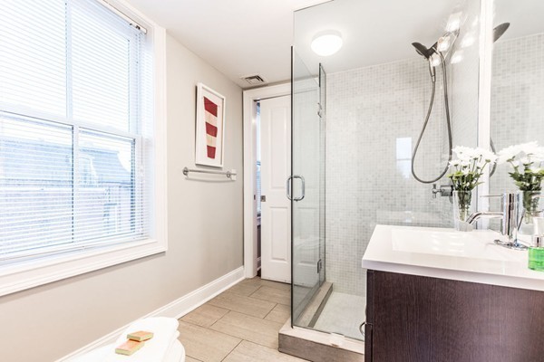 80 Rutland Street, Unit 3 Boston, MA 02118 - Photo 8 of 26 a bathroom with a sink a mirror and a shower