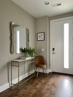 a workspace with furniture and window