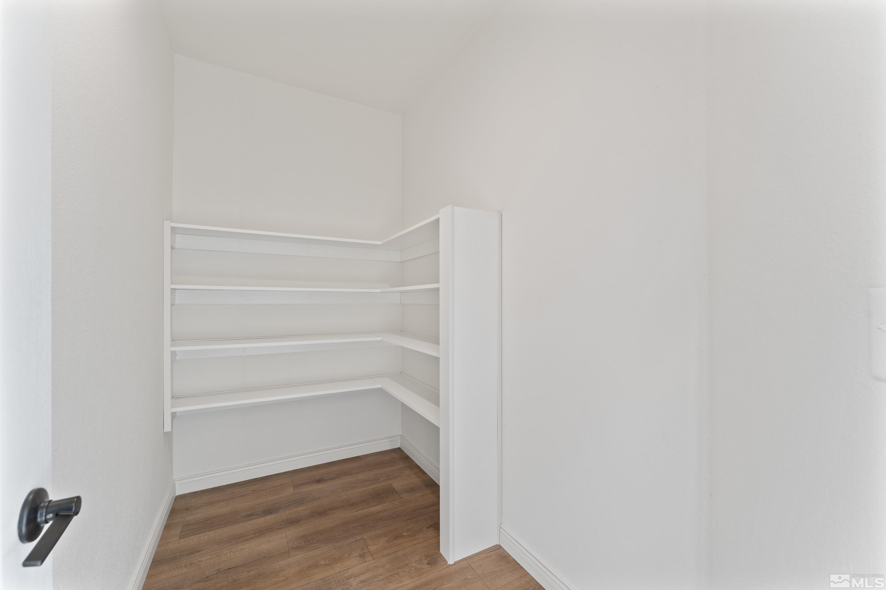 90 Horseshoe Circle Reno, NV 89508 - Photo 16 of 40 a view of walk in closet with empty racks