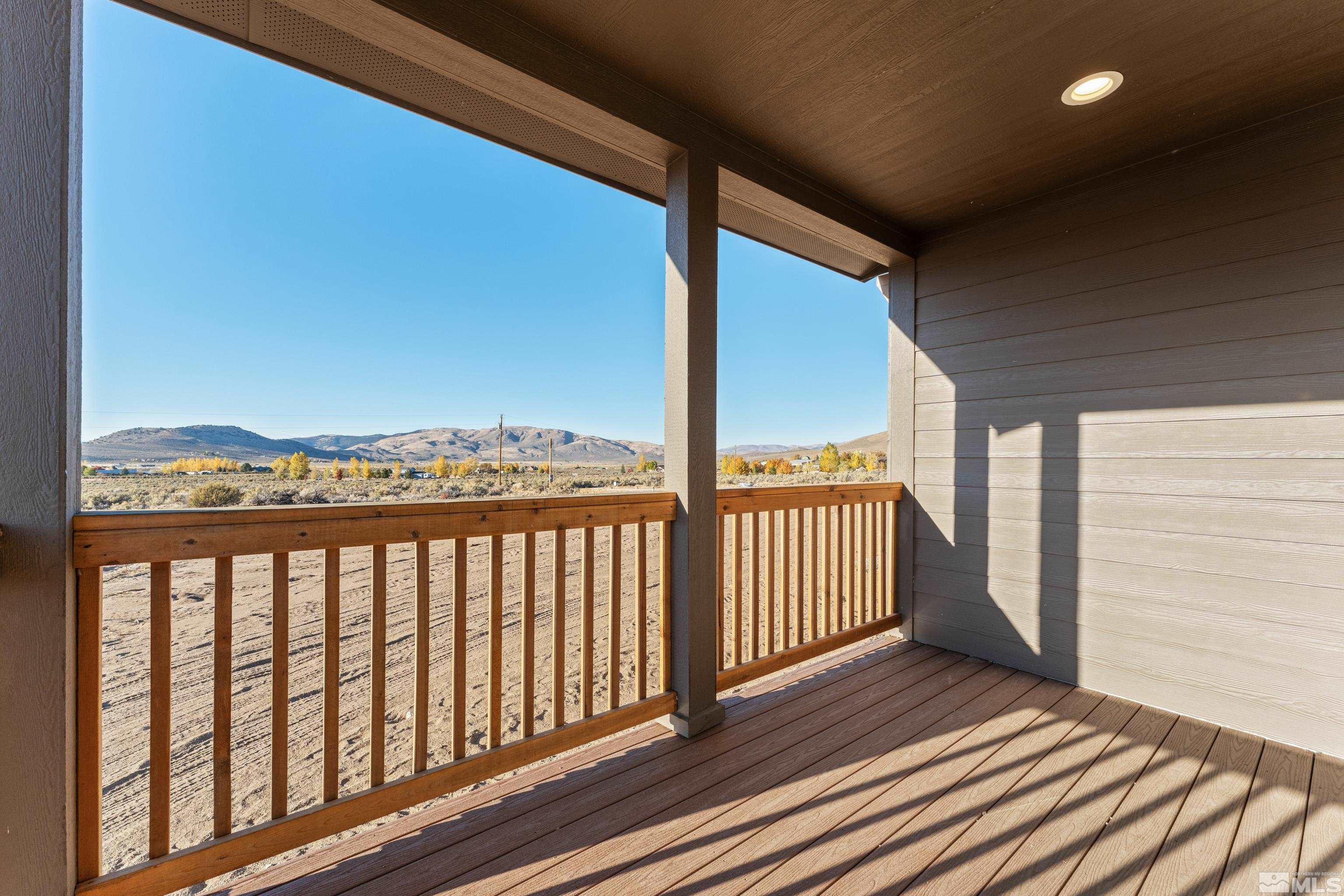 90 Horseshoe Circle Reno, NV 89508 - Photo 22 of 40 a view of a balcony with wooden floor