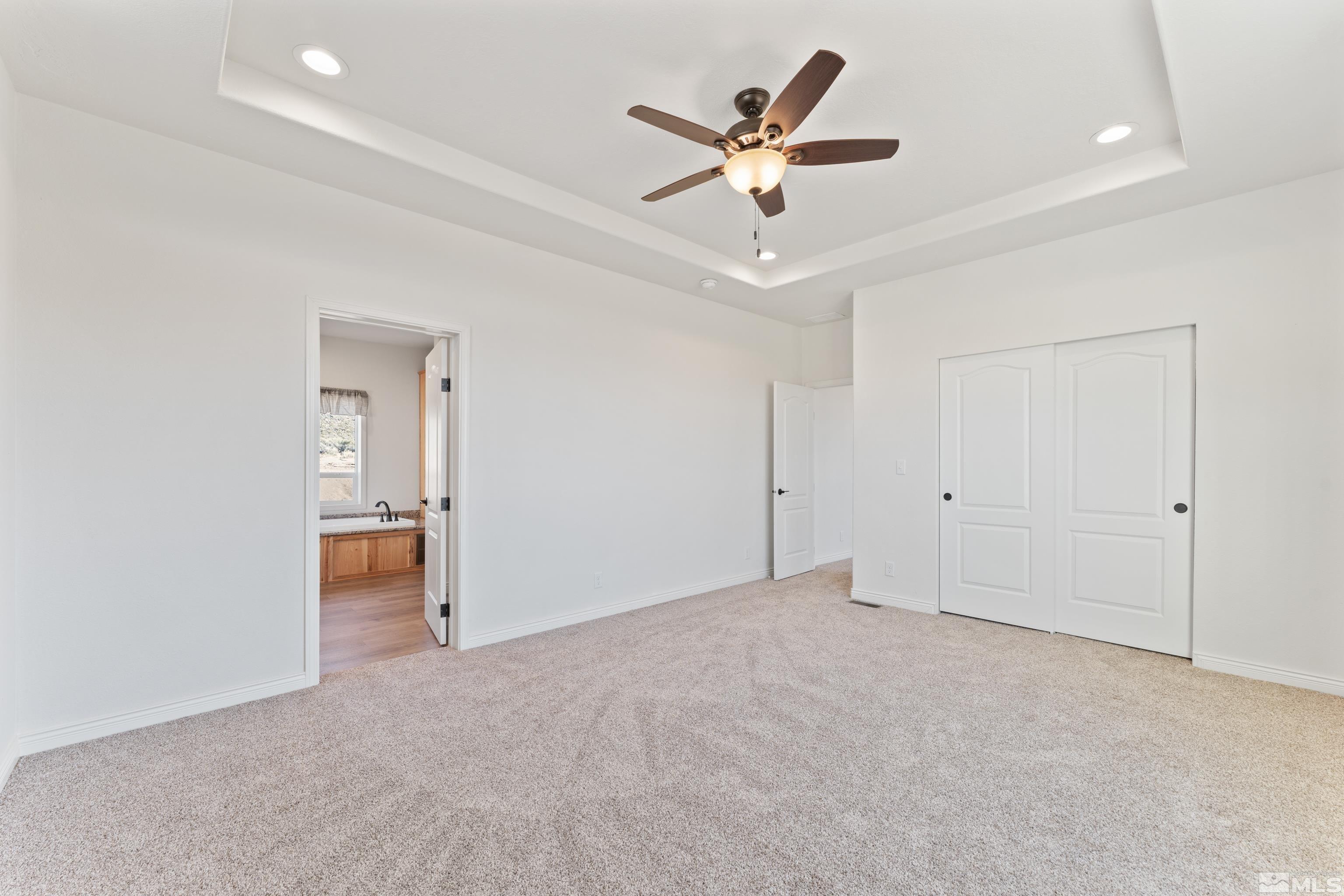 90 Horseshoe Circle Reno, NV 89508 - Photo 24 of 40 a view of a livingroom with a ceiling fan