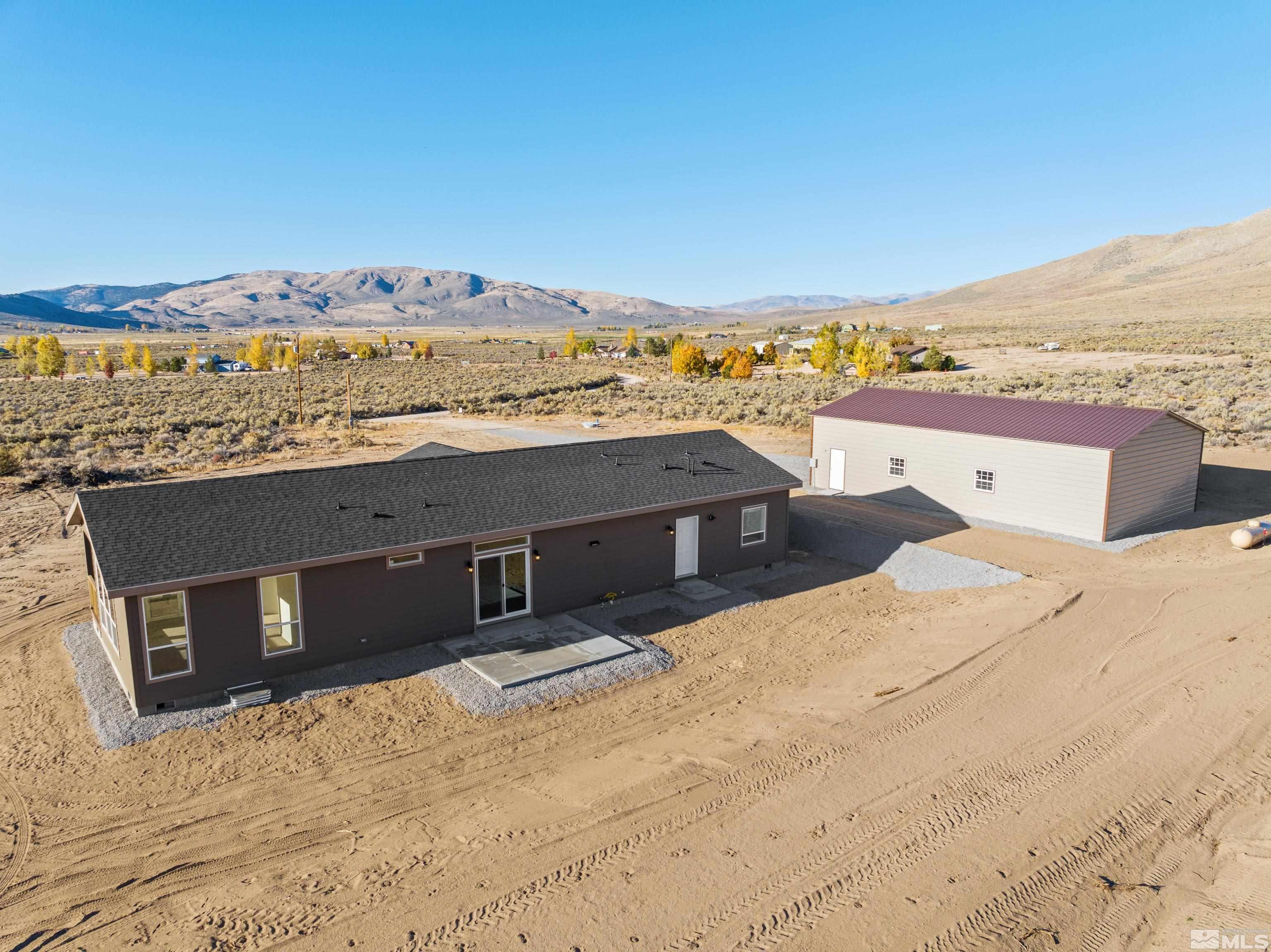 90 Horseshoe Circle Reno, NV 89508 - Photo 40 of 40 a picture of a building with a mountain view