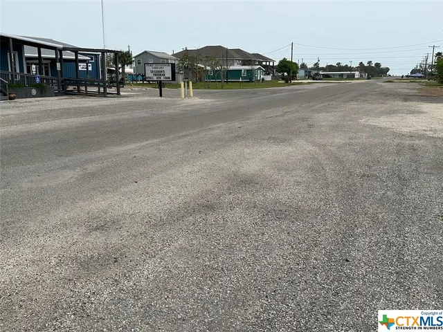 a view of street with houses