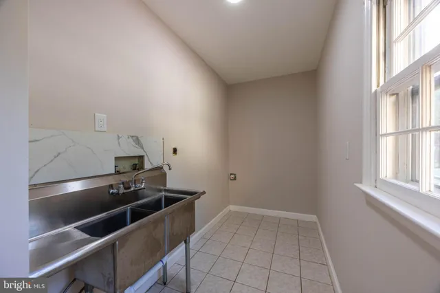 a bathroom with a sink toilet and vanity