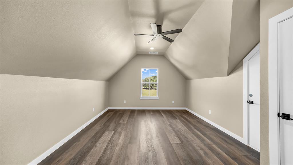 3 Quarter Loop Poolville, TX 76487 - Photo 27 of 40 wooden floor in an empty room with a window