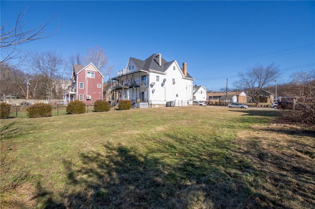536 Penn Street Verona, PA 15147 - Photo 11 of 18 a view of a house with a yard