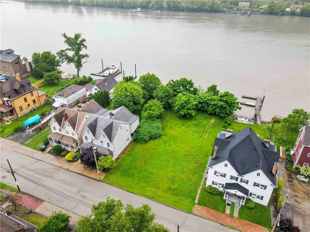536 Penn Street Verona, PA 15147 - Photo 6 of 18 an aerial view of a house with a lake view