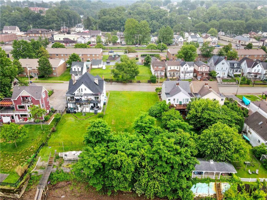 536 Penn Street Verona, PA 15147 - Photo 7 of 18 an aerial view of residential houses with outdoor space and trees